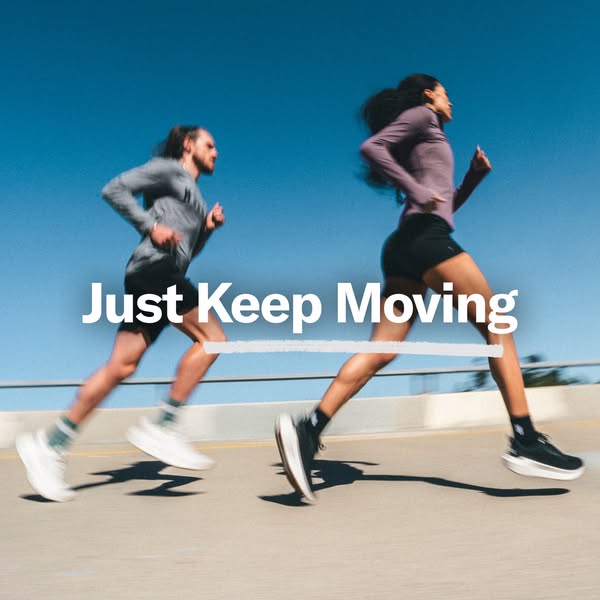 This image ad features a blurred image of two runners, with the text "Just Keep Moving" overlaid in the center