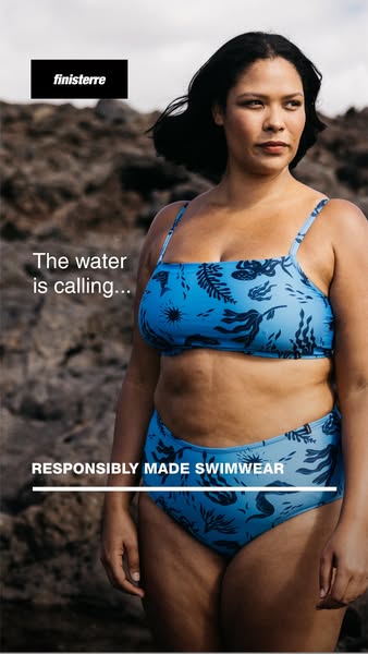 The ad showcases a woman wearing a blue patterned Finisterre bikini. The ad has text overlay about the brand's missi