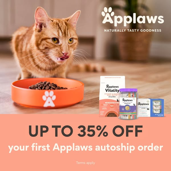 This ad for Applaws features a ginger cat next to a bowl of dry cat food along with an assortment of Applaws products. T