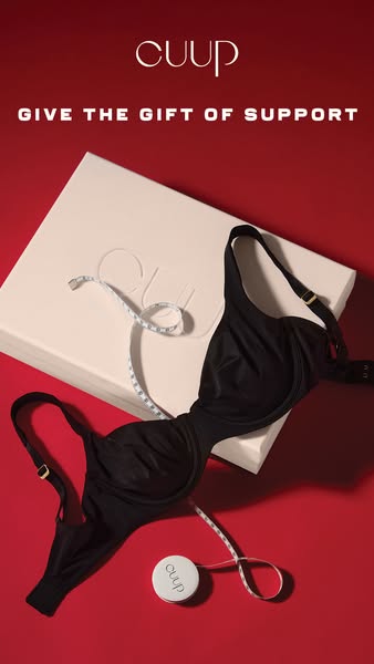 This ad showcases a black bra from CUUP, emphasizing its supportive qualities and positioning it as a thoughtful gift.