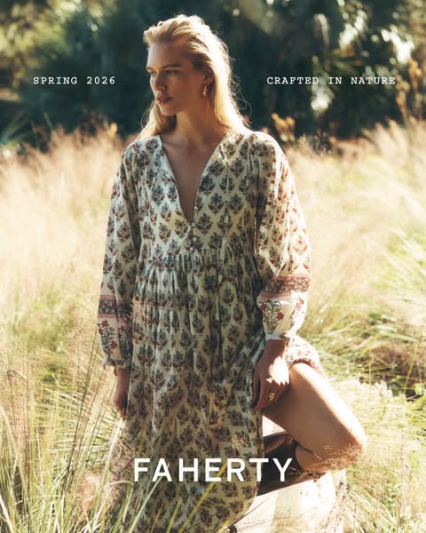 This image ad showcases a woman in a flowing floral dress in a natural outdoor setting, promoting the Faherty brand with