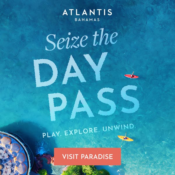 This ad for Atlantis Bahamas promotes their Day Pass over a background of the resort's clear turquoise water. The ad