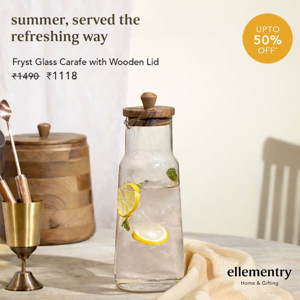 This image ad showcases the Fryst Glass Carafe with Wooden Lid from ellementry, emphasizing its refreshing summer appeal