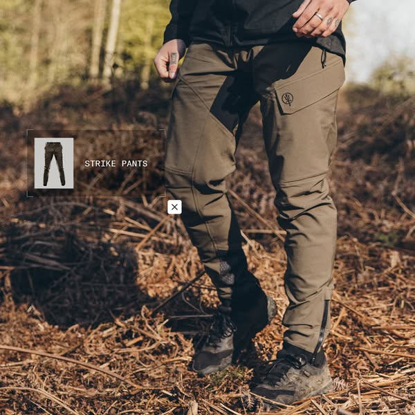 This ad features a close-up shot of a person wearing a pair of olive green 'Strike Pants' while standing in a wo