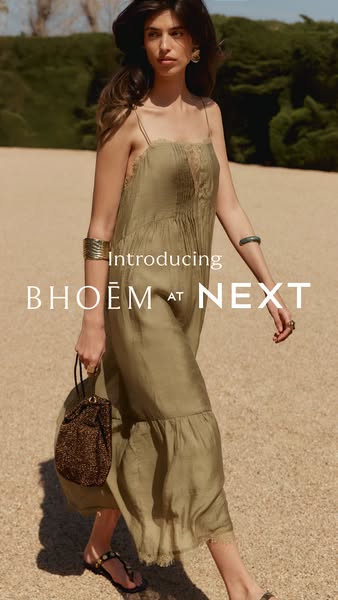 This ad introduces the BHÖEM brand as it launches at NEXT. It features a woman walking towards the camera wearing a dres
