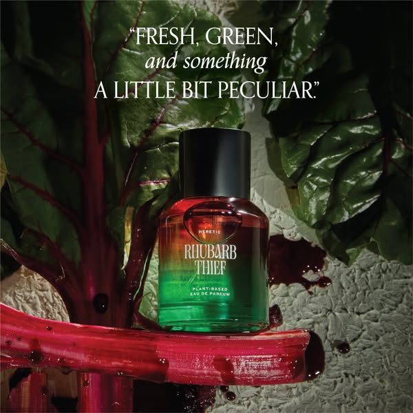 This ad features Heretic Rhubarb Thief Plant-Based Eau De Parfum, showcasing the perfume bottle against a backdrop of rh