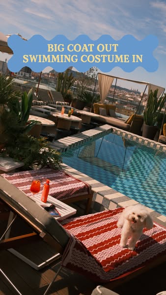 This ad uses a lifestyle image taken at a rooftop pool to signal the brand is relevant for affluent or aspirational cust