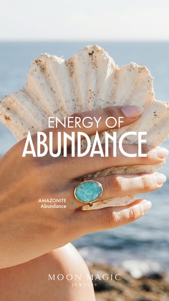 This ad for Moon Magic Jewelry features an image of the brand's Amazonite Abundance ring being held in front of a be