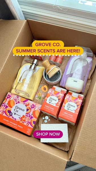 This image ad showcases Grove Co. products, including their new summer scents, presented in a cardboard box. The ad enco