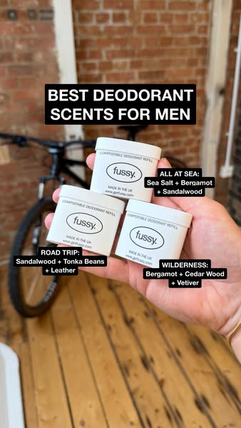 This image ad showcases deodorant refills from Fussy, emphasizing their natural scents and sustainable packaging. Three 