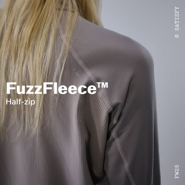 This ad showcases the FuzzFleece Half-zip from Satisfy. The ad features a close-up shot of the garment on a person, high