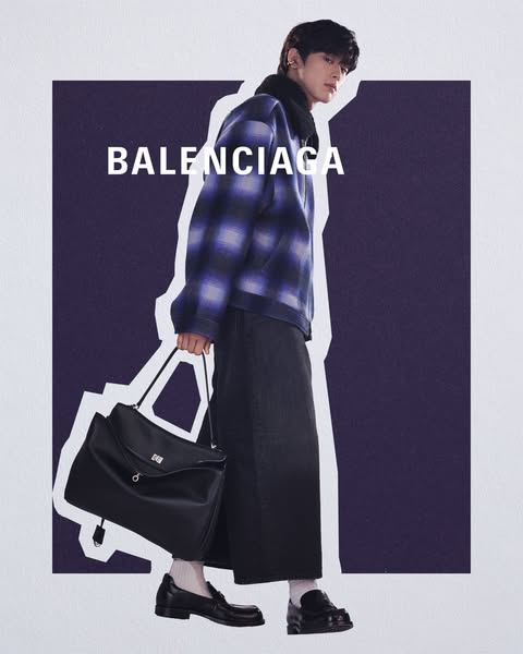 This ad showcases a Balenciaga handbag, highlighting the brand's minimalist aesthetic through a stylish, posed model