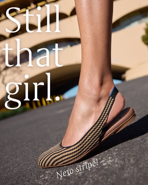 This image ad showcases a single Rothy's shoe of a new stripe pattern, positioned on a paved surface in front of a b