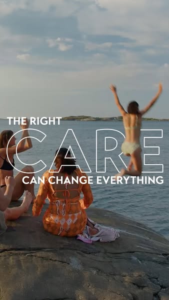 The image ad shows a group of people sitting on a rock near water. One person is jumping into the water and the ad displ
