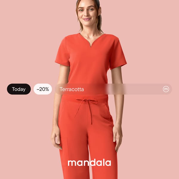 This image ad presents a woman wearing terracotta-colored scrub pants and top by the brand Mandala. The ad highlights a 
