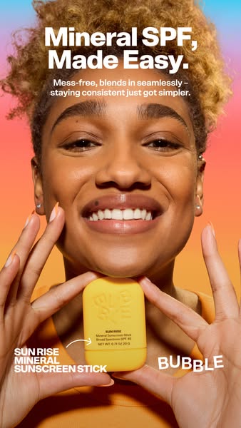 This ad promotes Bubble's Sun Rise Mineral Sunscreen Stick. A smiling woman holds up the product, emphasizing its me