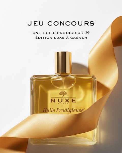 This ad promotes Nuxe's Huile Prodigieuse in a luxurious edition. The image features the product prominently display