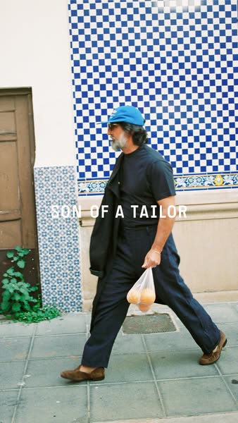 This ad features a man in Son of a Tailor clothing walking down the street, emphasizing the brand's clothing as suit