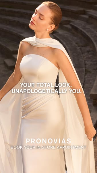 This ad for Pronovias features a woman in a wedding dress and prompts viewers to book an in-store appointment.