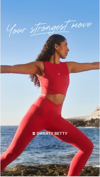 This Sweaty Betty ad shows a model in a matching red workout outfit, wearing a red Sweaty Betty workout set and doing a