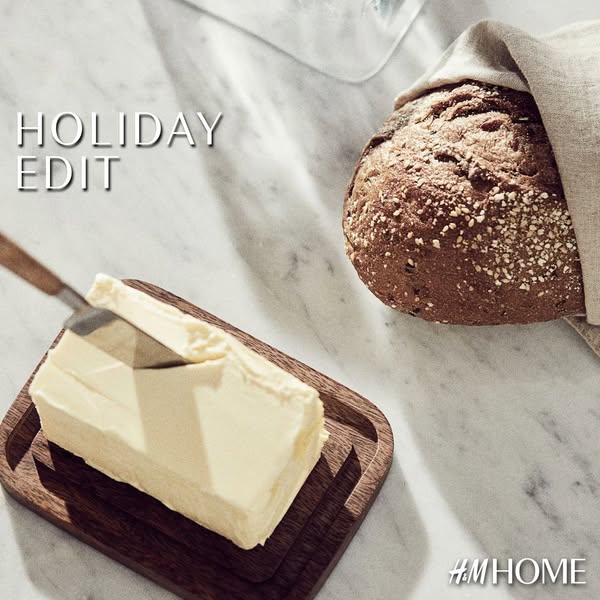 This ad for H&M Home features a curated selection of items perfect for the holidays. It presents an artful table set