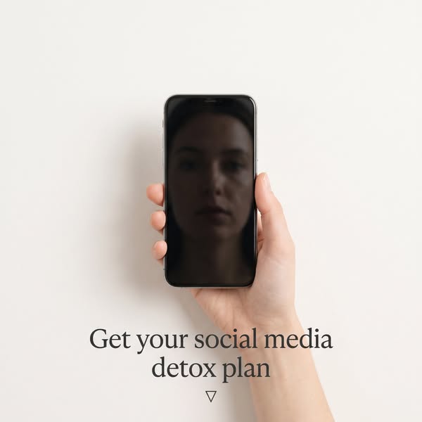 This ad promotes a social media detox plan, using a minimalist aesthetic that features a hand holding a turned-off smart