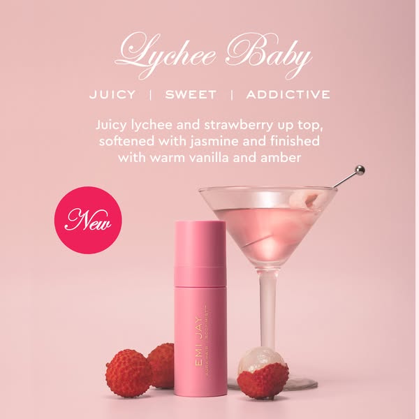 This ad promotes Emi Jay's Lychee Baby Aura Hair Body Mist. The image displays the product along with lychees and a 