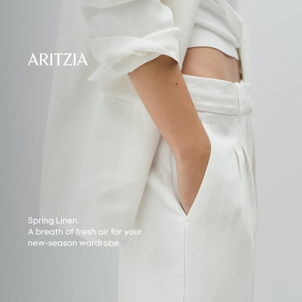 This image ad by Aritzia showcases white linen clothing for spring, emphasizing a fresh and seasonal wardrobe update.