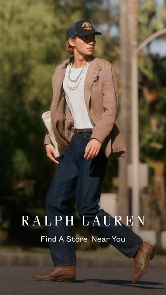 This Ralph Lauren ad features a lifestyle shot of a man walking down a sunny street wearing Ralph Lauren clothing. The a