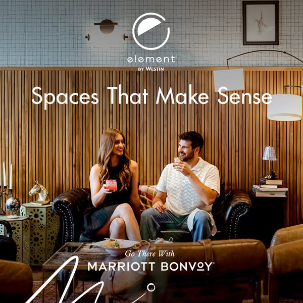 This ad for Element Hotels shows a young couple lounging in a well-appointed space, enjoying drinks and snacks. The ad u