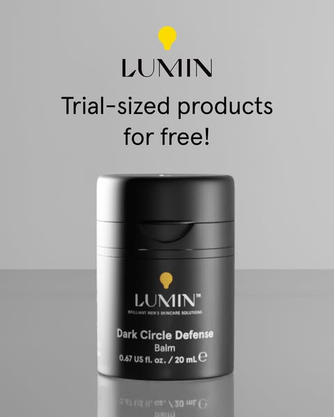 This image ad promotes Lumin's Dark Circle Defense Balm, offering trial-sized products for free. The ad features a c