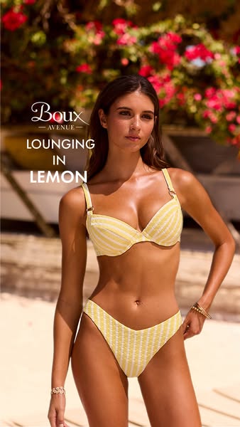 This ad features a woman in a yellow bikini from Boux Avenue, promoting a lounging style for swimwear.