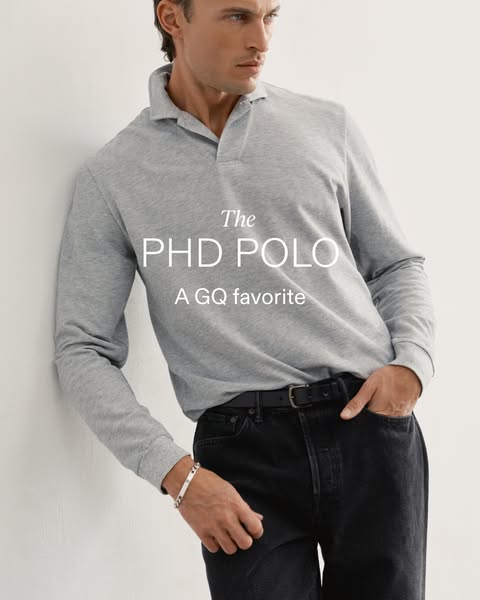 This ad showcases a man modeling a long-sleeve polo shirt, highlighting its style and presenting it as a GQ favorite.