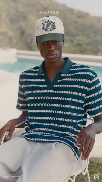 This Mauvais image ad features a man wearing a polo and cap.