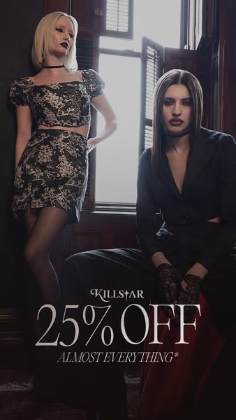 This ad for KILLSTAR clothing features two female-presenting models in a dimly lit room, showcasing the brand's aest
