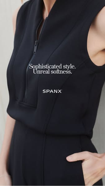 This ad highlights the soft, sophisticated style of a zip-up jumpsuit from Spanx.
