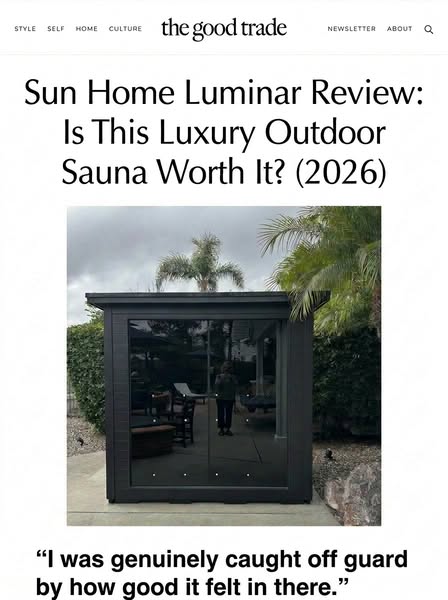 This image is an ad for Sun Home Luminar, advertising their luxury outdoor sauna. It features a review from The Good Tra