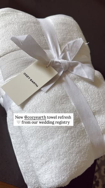 This ad showcases new towels from Cozy Earth, presented as a wedding registry gift, using the brand mention and heart em