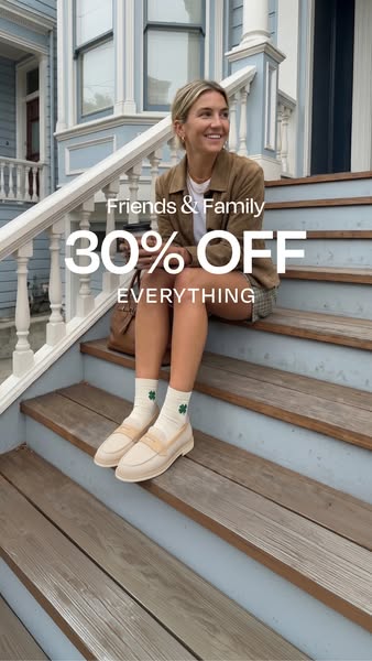 The ad features a smiling woman sitting on outdoor steps wearing loafers and socks with a discount offer of 30% off ever