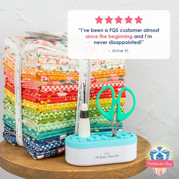 This ad features a stack of quilting fabric sitting next to a notion organizer. Above the organizer and fabric is a box 