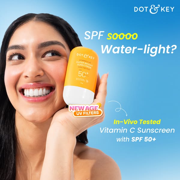 This ad for Dot & Key Vitamin C sunscreen features a woman holding the product and smiling. The ad highlights the pr