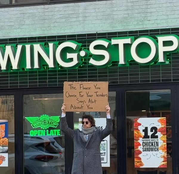DudewithSign ad