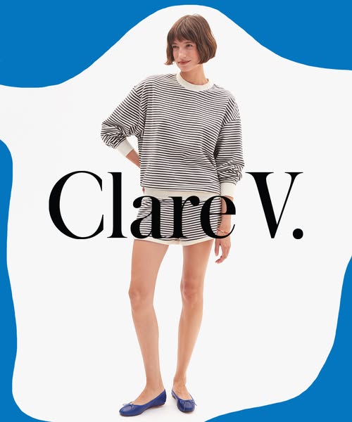 This ad features a model showcasing a striped sweater and shorts from Clare V.