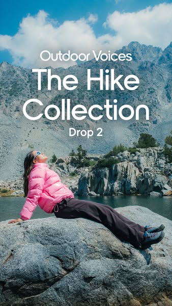 This image ad for Outdoor Voices features a woman in hiking apparel sitting on a rock in front of a mountain lake. The a