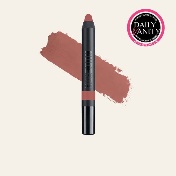This ad features a Nudestix matte lipstick crayon and a Daily Vanity Beauty Award badge. The ad is designed to highlight