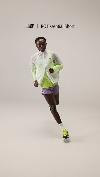 This ad features a man running in New Balance apparel. The ad highlights the RC Essential Short.