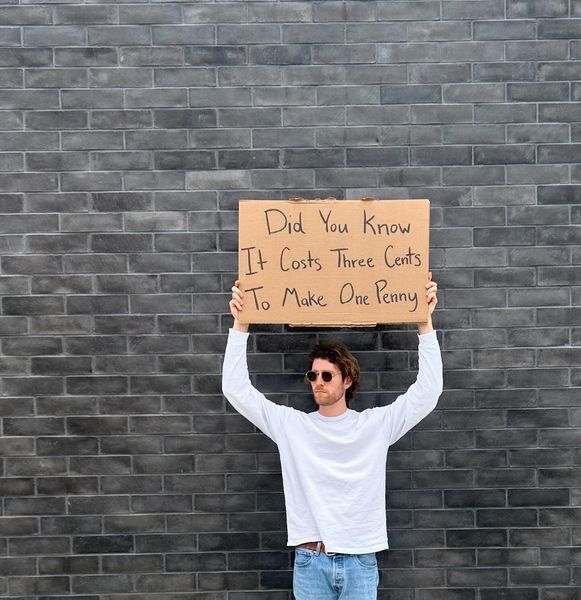 DudewithSign ad