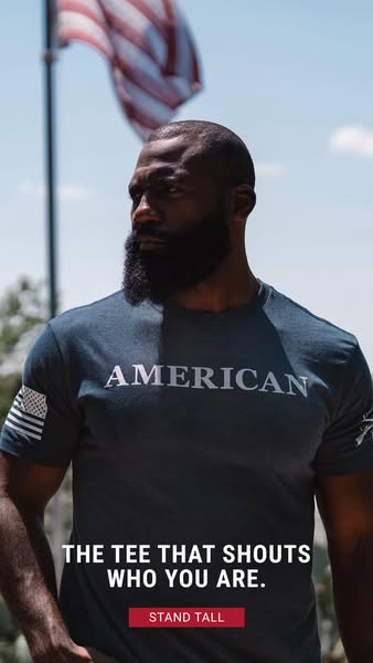A man is wearing a t-shirt that says AMERICAN. The text in the ad states, "The tee that shouts who you are."