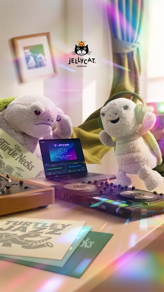 This ad features two Jellycat turtle plush toys in a DJ setting, complete with a laptop, DJ equipment, and vinyl records
