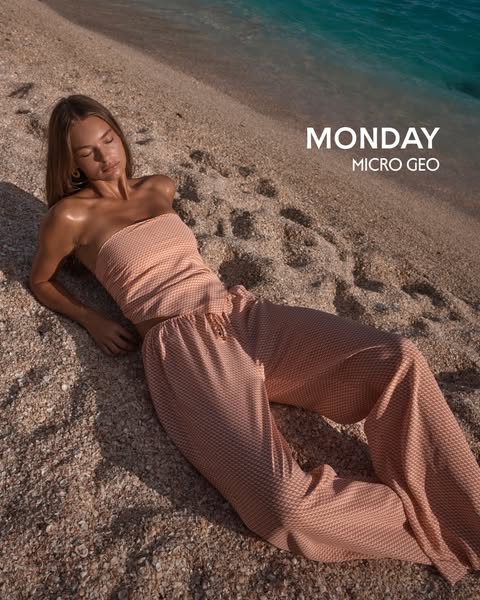 This image ad showcases a matching tube top and pant set with a micro geo pattern from the brand MONDAY. The model is re